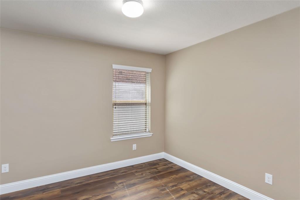 1450 Arabella Avenue Forney, TX 75126 - Photo 25 of 40 a view of a room with wooden floor and a window