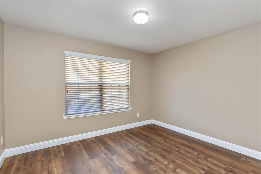 1450 Arabella Avenue Forney, TX 75126 - Photo 26 of 40 wooden floor in an empty room with a window