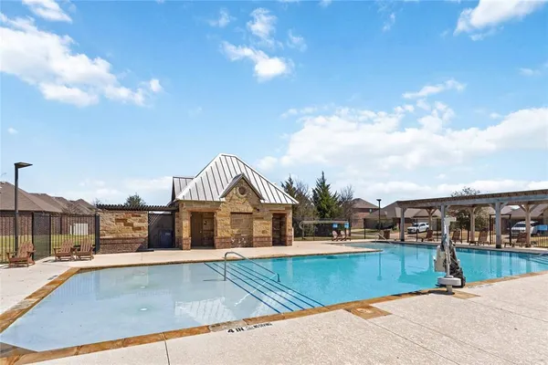a view of a house with a swimming pool