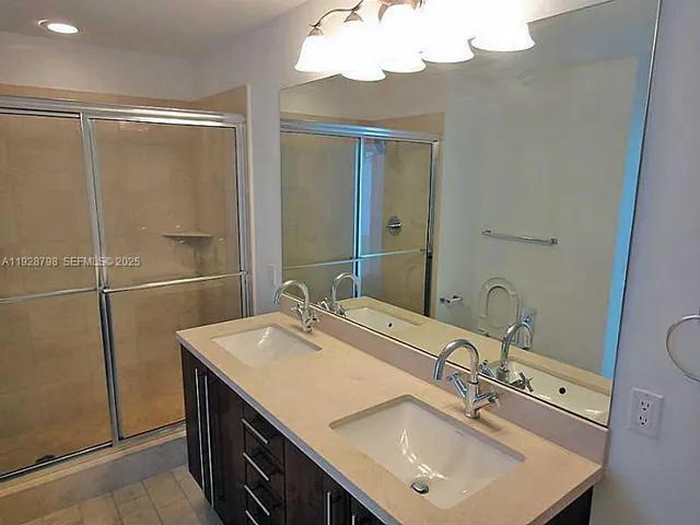 a bathroom with a sink and a tub
