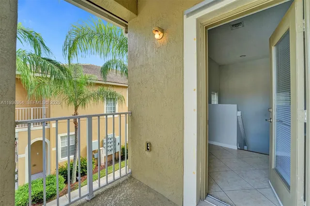 a view of balcony with small garden