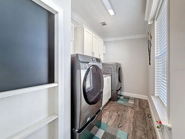 a utility room with dryer and washer