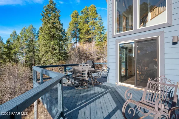 a view of a house with a yard and garage