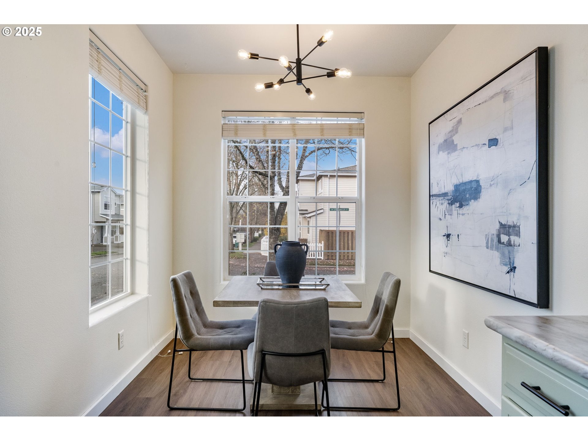 18186 Southwest Strathmoor Street Beaverton, OR 97007 - Photo 11 of 35 a dining room with furniture and window