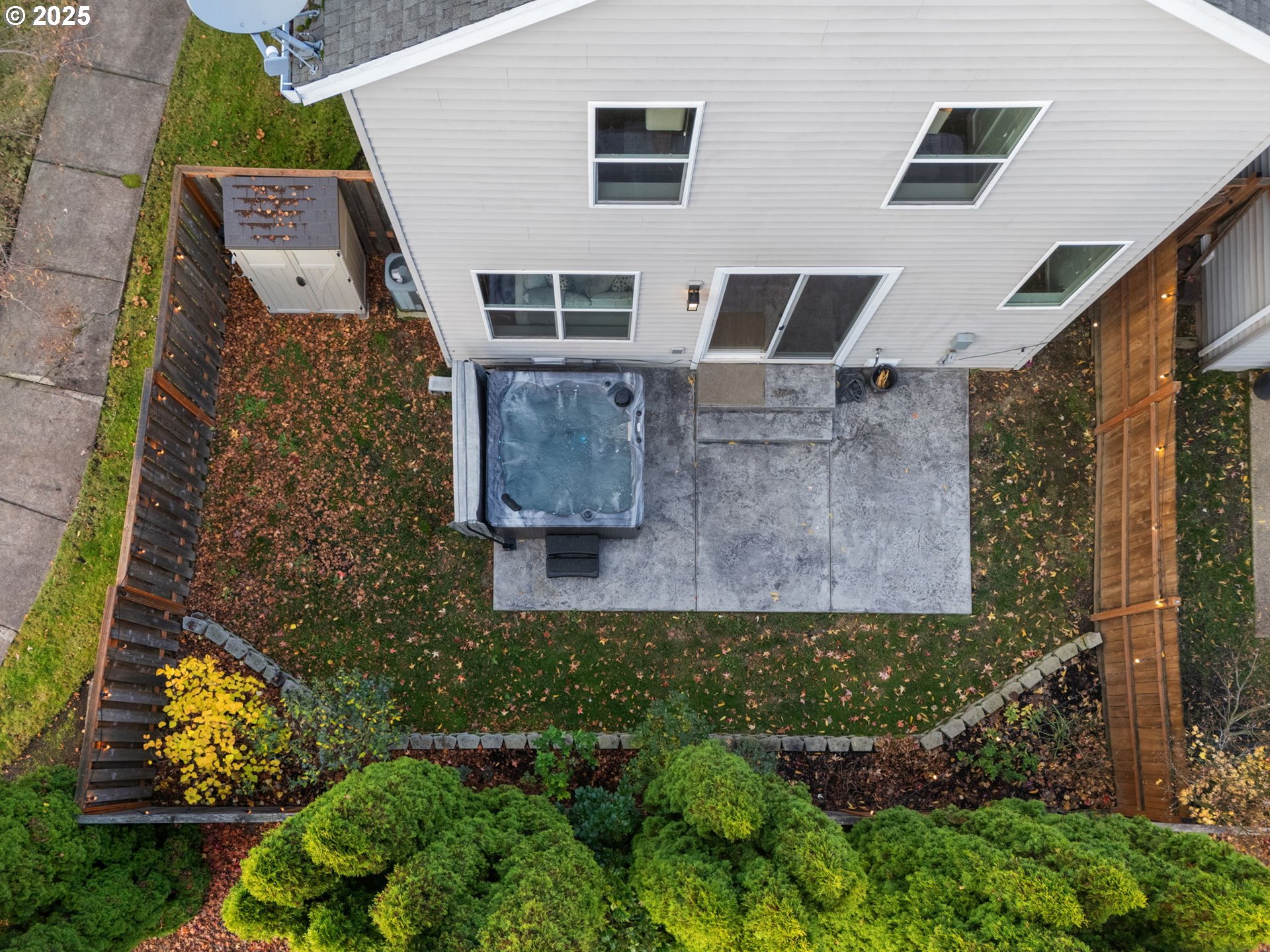 18186 Southwest Strathmoor Street Beaverton, OR 97007 - Photo 30 of 35 an aerial view of a house with a yard