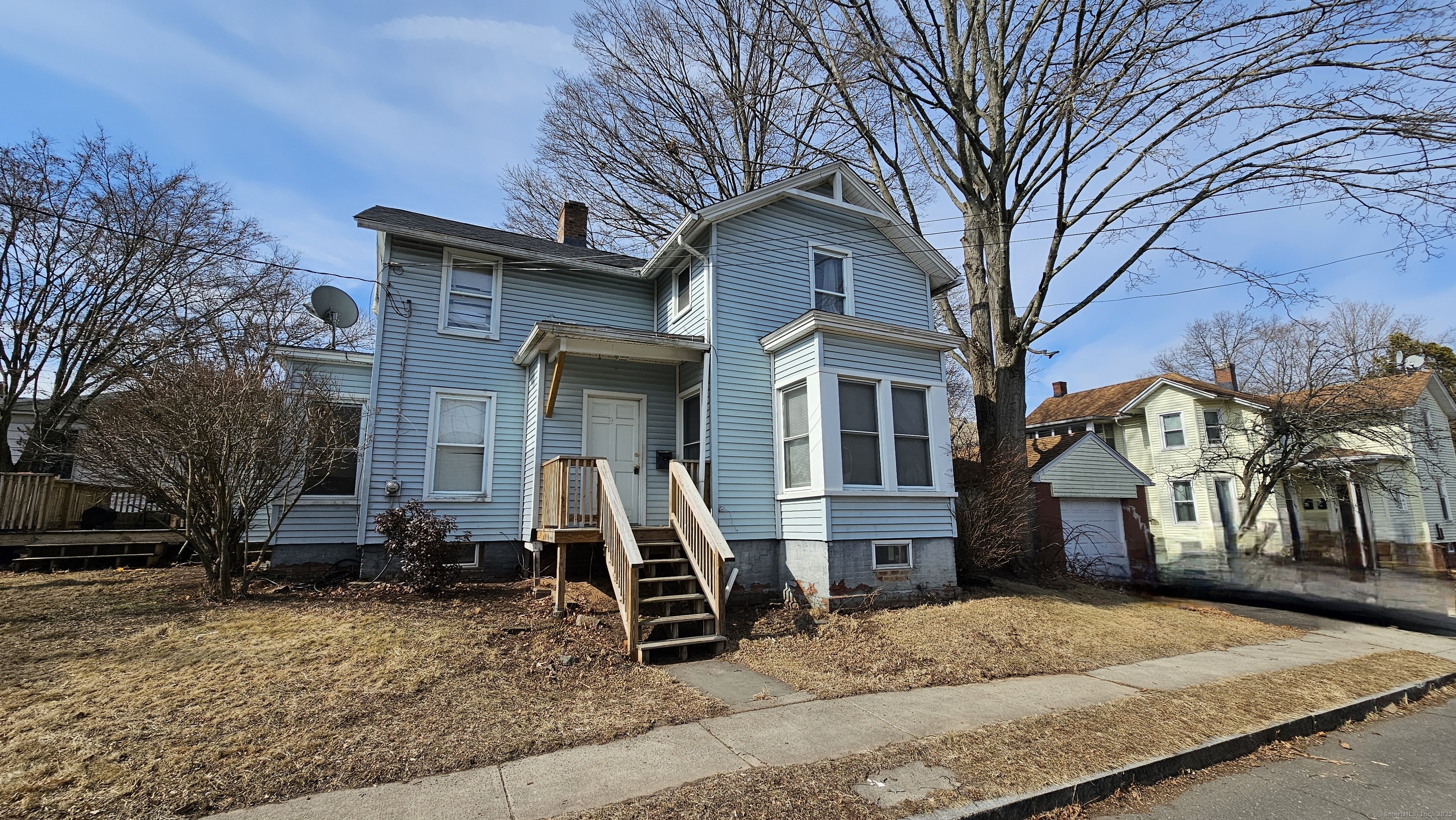 19 Bacon Avenue Middletown, CT 06457 - Photo 1 of 1 a view of a house with a yard