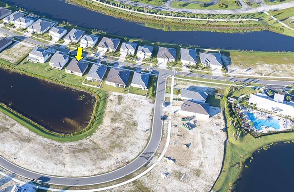 10231 Southwest Highpointe Drive, Unit ASHBY 281 Stuart, FL 34997 - Photo 2 of 33 a view of a dining room with furniture