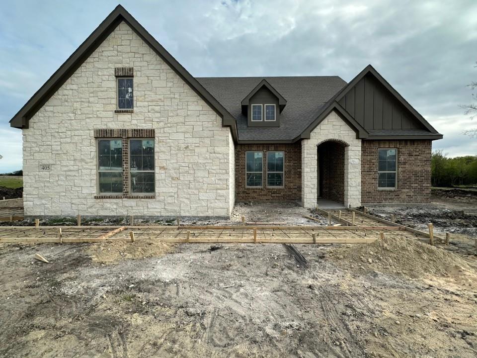 405 Cobb Road Leonard, TX 75452 - Photo 1 of 27 a front view of a house with garden