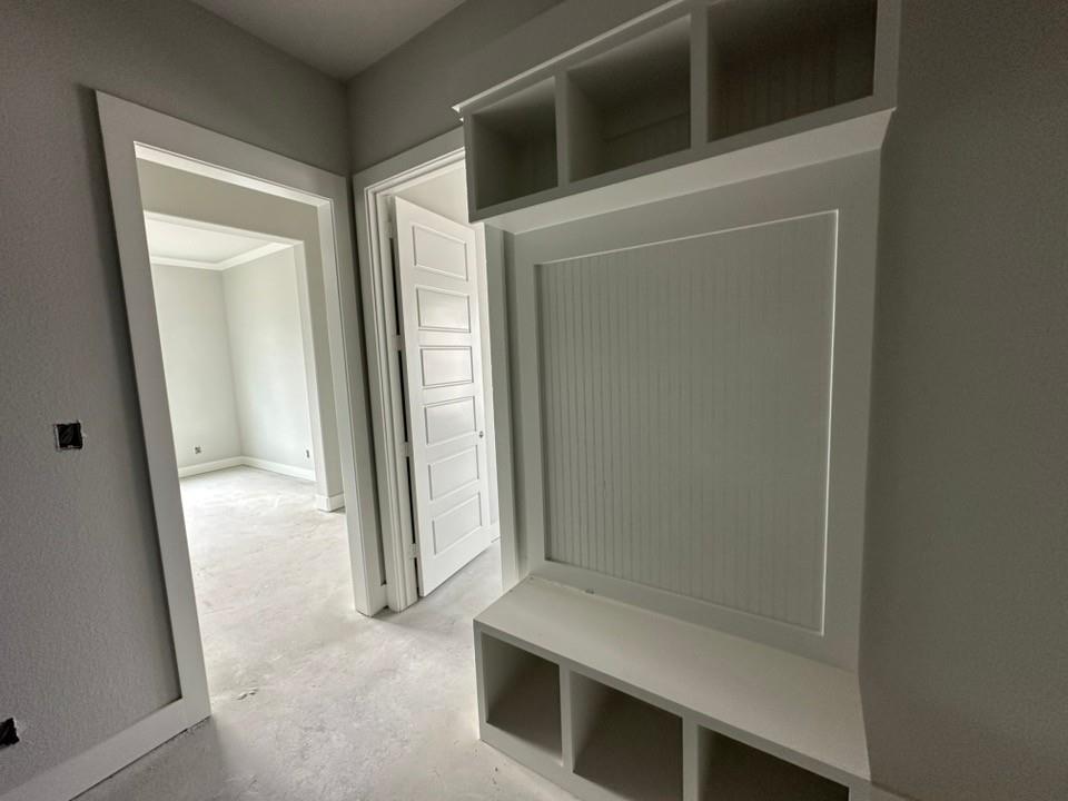 405 Cobb Road Leonard, TX 75452 - Photo 11 of 27 a view of a hallway with wooden floor and staircase