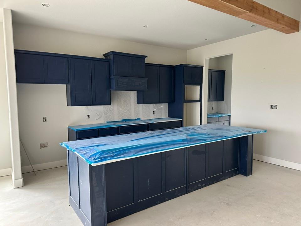 405 Cobb Road Leonard, TX 75452 - Photo 14 of 27 a kitchen with kitchen island stainless steel appliances a sink stove and refrigerator
