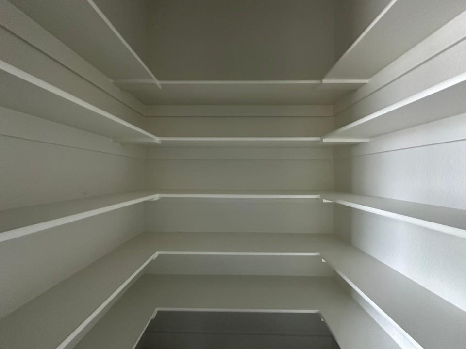 405 Cobb Road Leonard, TX 75452 - Photo 17 of 27 a view of walk in closet with empty racks