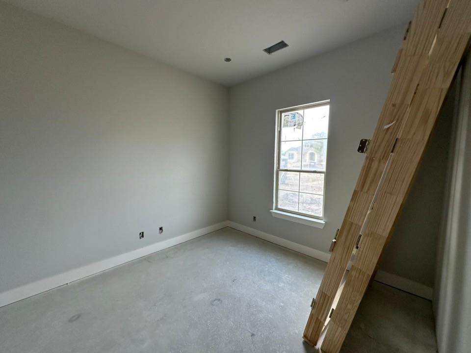 405 Cobb Road Leonard, TX 75452 - Photo 7 of 27 an empty room with a window