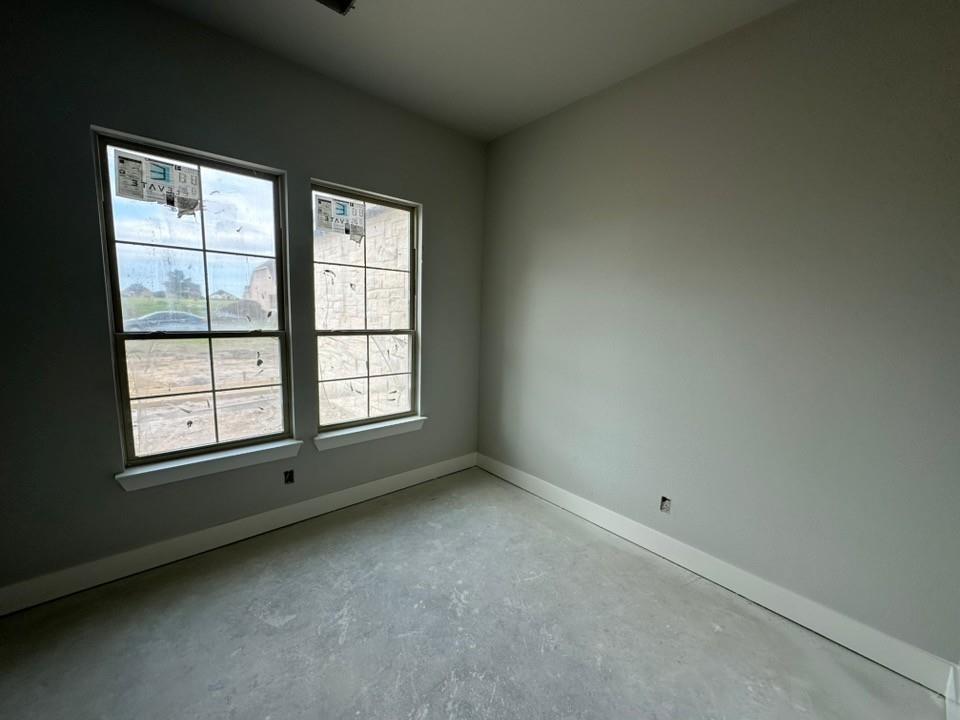 405 Cobb Road Leonard, TX 75452 - Photo 10 of 27 an empty room with a window