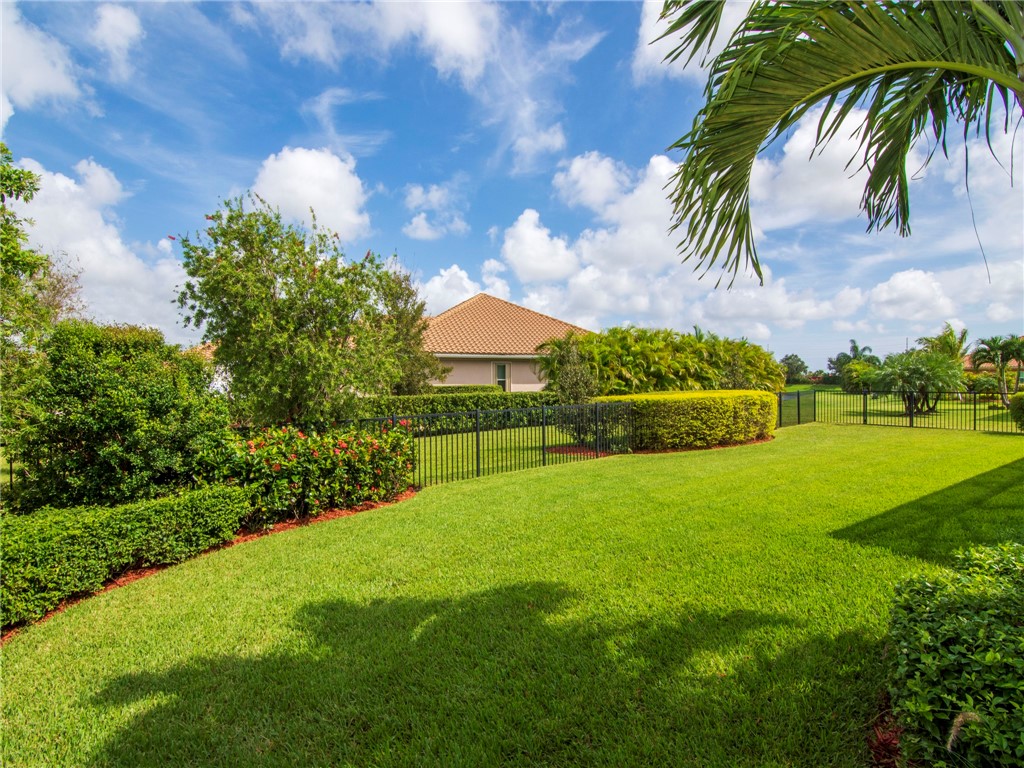 8260 Halbert Lane Vero Beach, FL 32968 - Photo 27 of 36 a view of an outdoor space and a yard