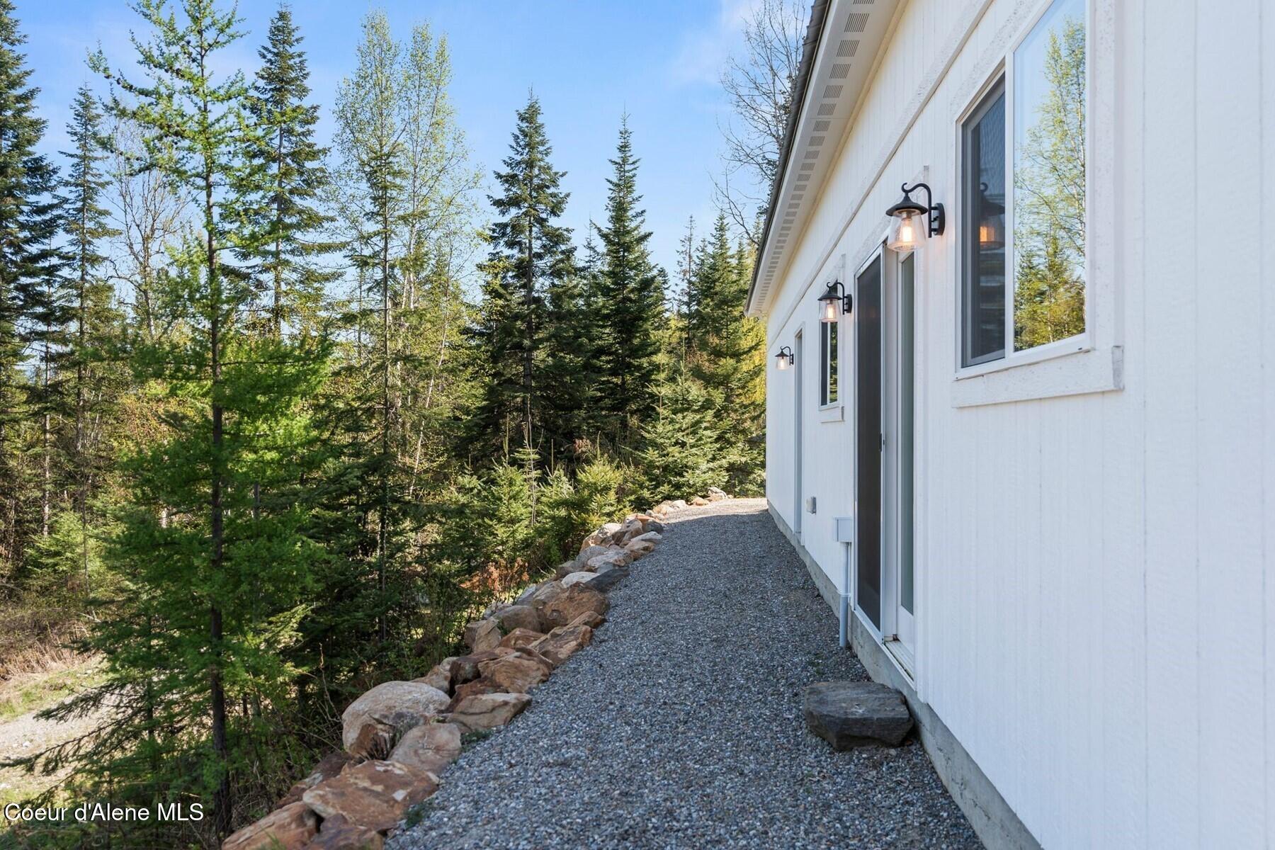 247 Living Waters Way Priest River, ID 83856 - Photo 15 of 29 Gravel walk way