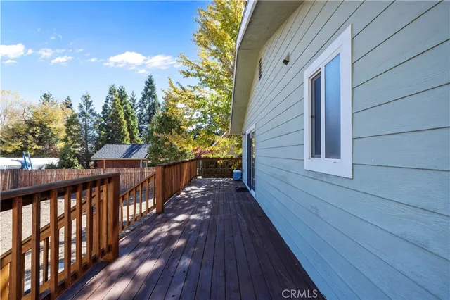 aerial view of a house with a yard and garden