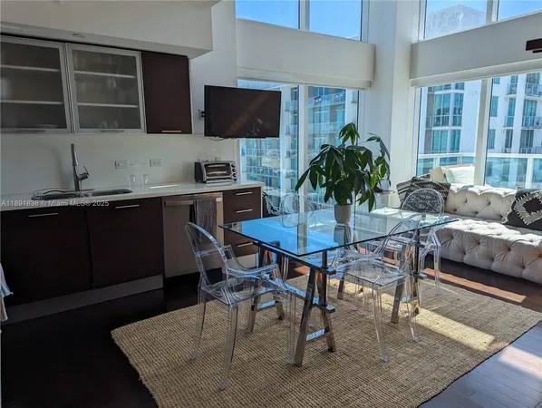 a view of a dining room with furniture