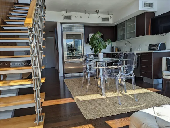 a view of a dining room with furniture