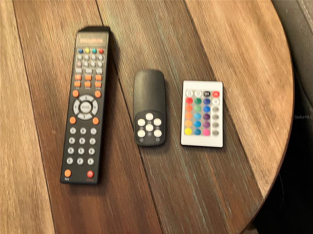 1775 Cupecoy Circle, Unit 4 Lutz, FL 33558 - Photo 26 of 33 a wooden door with glass top door