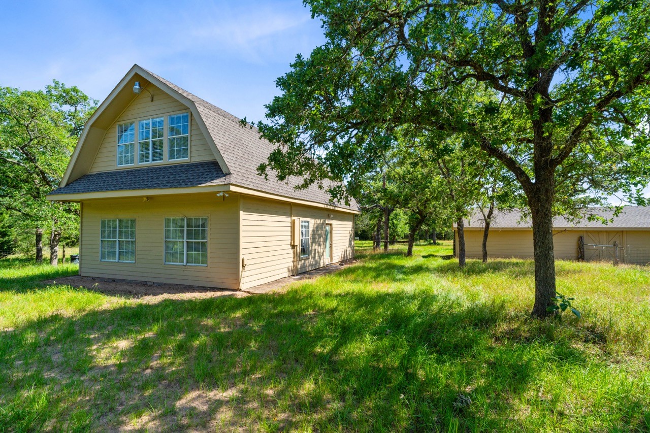 1019 Deer Field Court Weimar, TX 78962 - Photo 15 of 50 a view of a house with yard and tree s