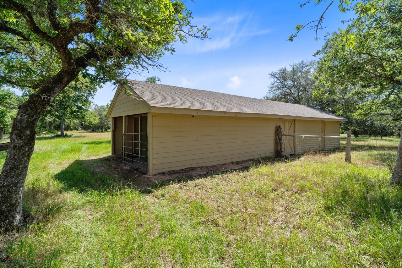 1019 Deer Field Court Weimar, TX 78962 - Photo 29 of 50 a view of backyard with garden