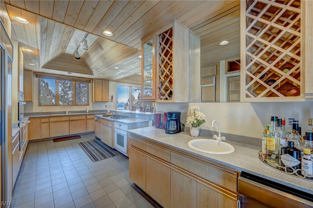 868 Tyner Way Incline Village, NV 89451 - Photo 14 of 25 a kitchen with a sink cabinets and wooden floor