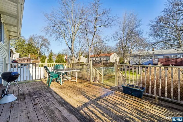 a view of a chairs and table on the wooden floor