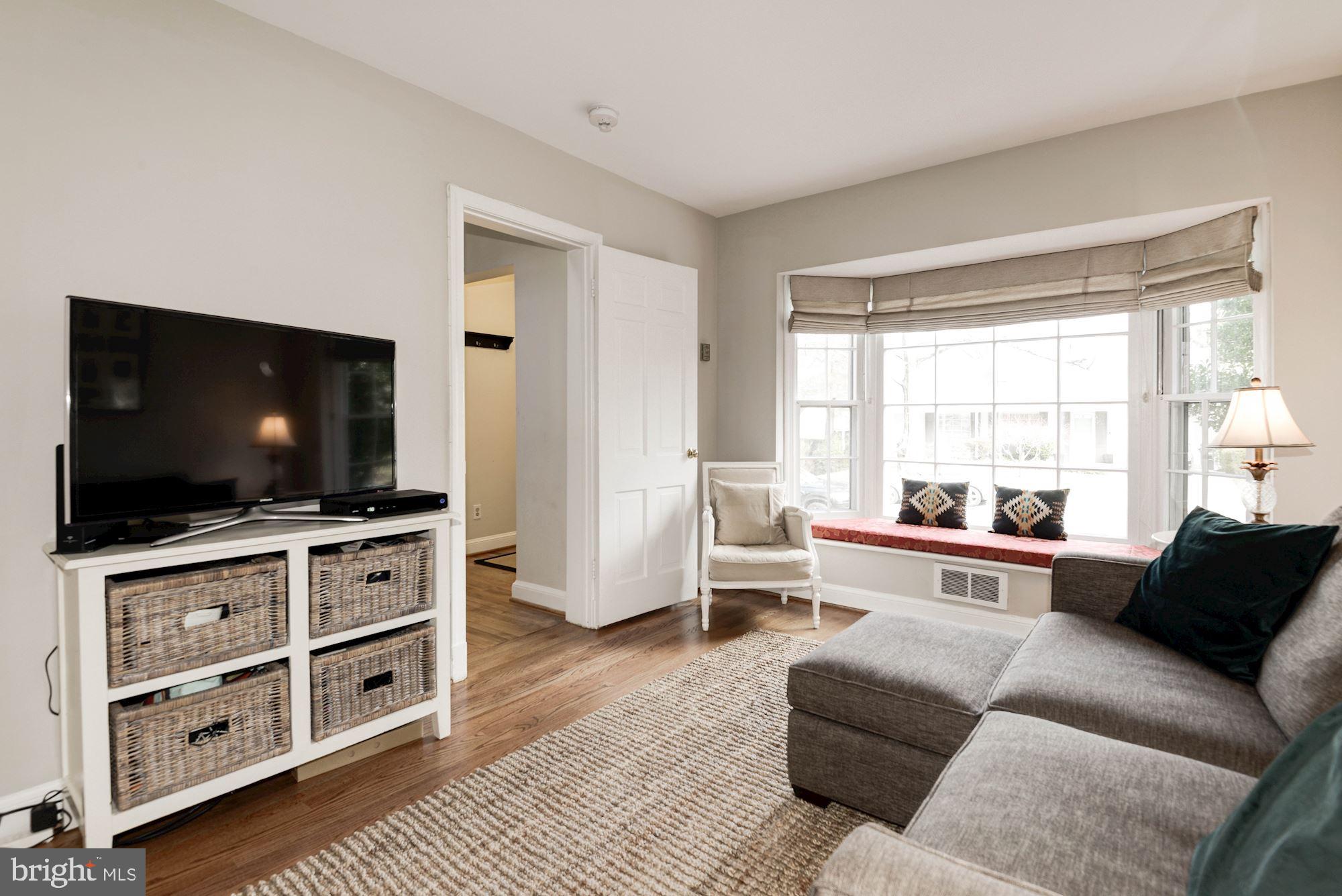 7504 Tarrytown Road Chevy Chase, MD 20815 - Photo 18 of 66 Den with bay window and bench