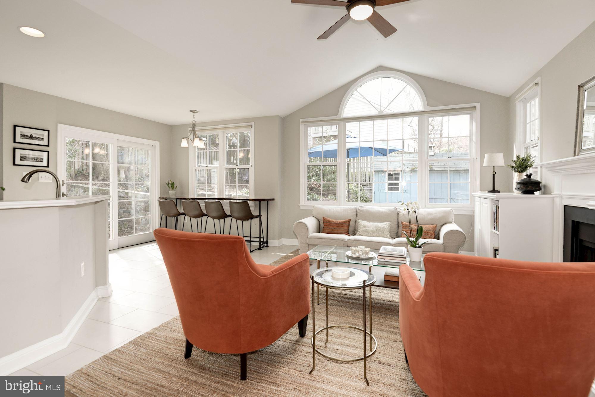 7504 Tarrytown Road Chevy Chase, MD 20815 - Photo 25 of 66 Great room with vaulted ceilings and fireplace