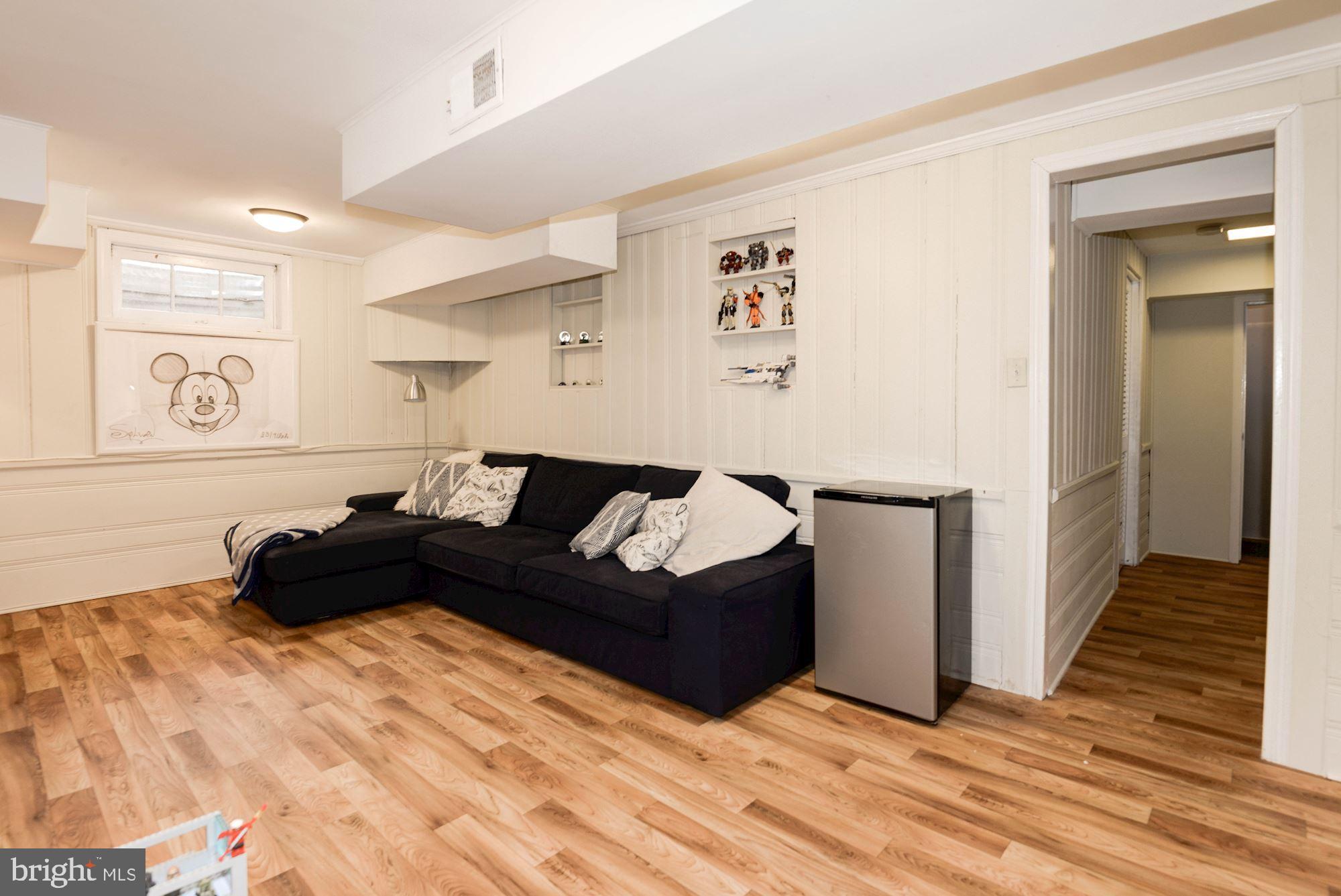 7504 Tarrytown Road Chevy Chase, MD 20815 - Photo 56 of 66 Finished basement with recreation & lounge space