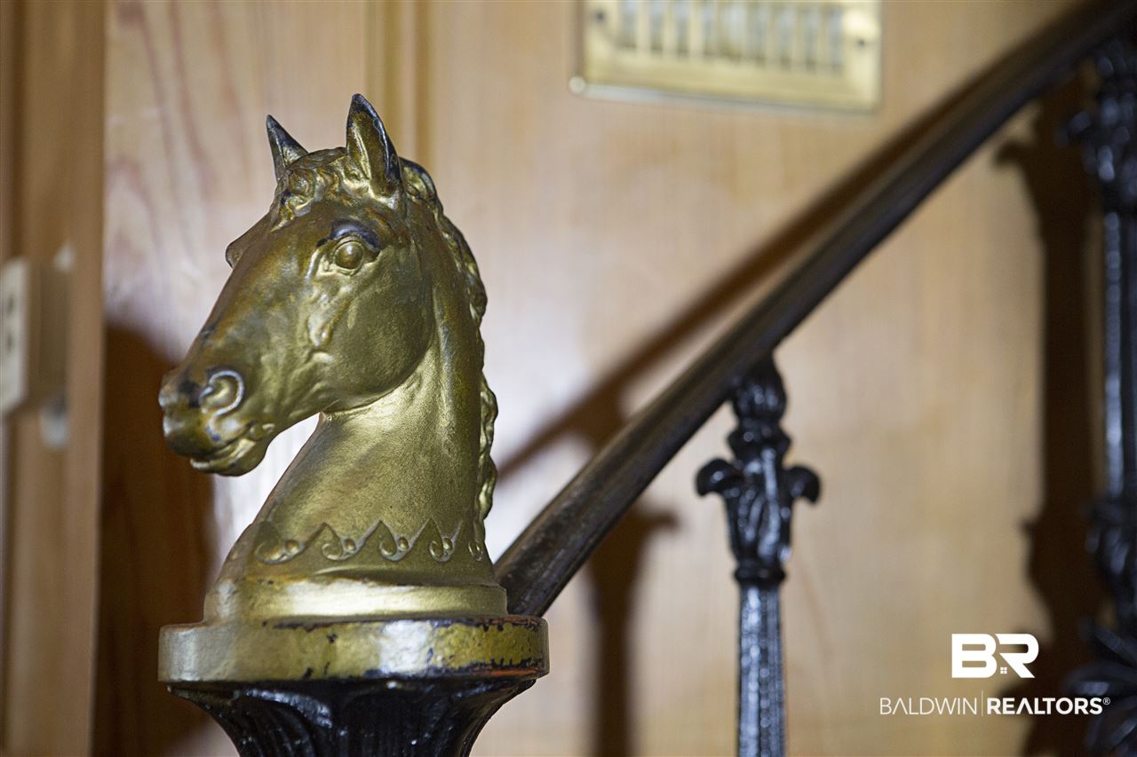 55 McGregor Avenue Mobile, AL 36608 - Photo 29 of 50 Horse head figure on spiral staircase
