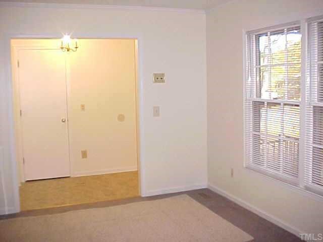 5509 McCormick Road Durham, NC 27713 - Photo 3 of 7 a view of an empty room with a window