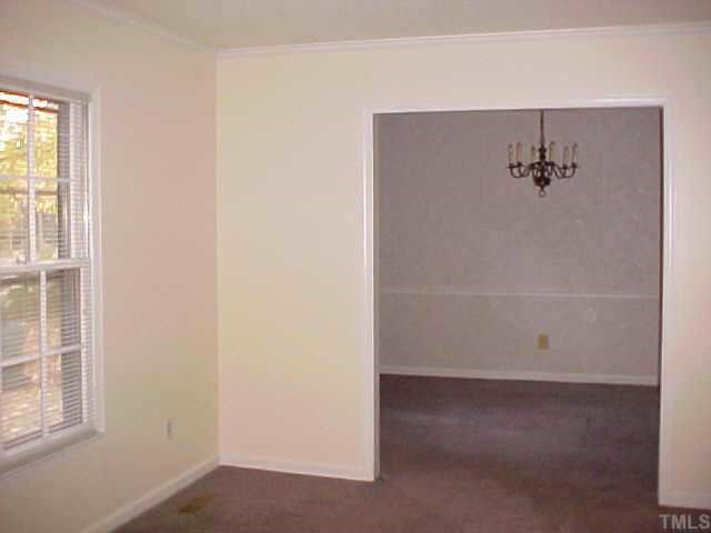 5509 McCormick Road Durham, NC 27713 - Photo 4 of 7 an empty room with window