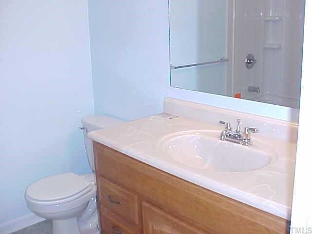 5509 McCormick Road Durham, NC 27713 - Photo 5 of 7 a bathroom with a sink and a toilet