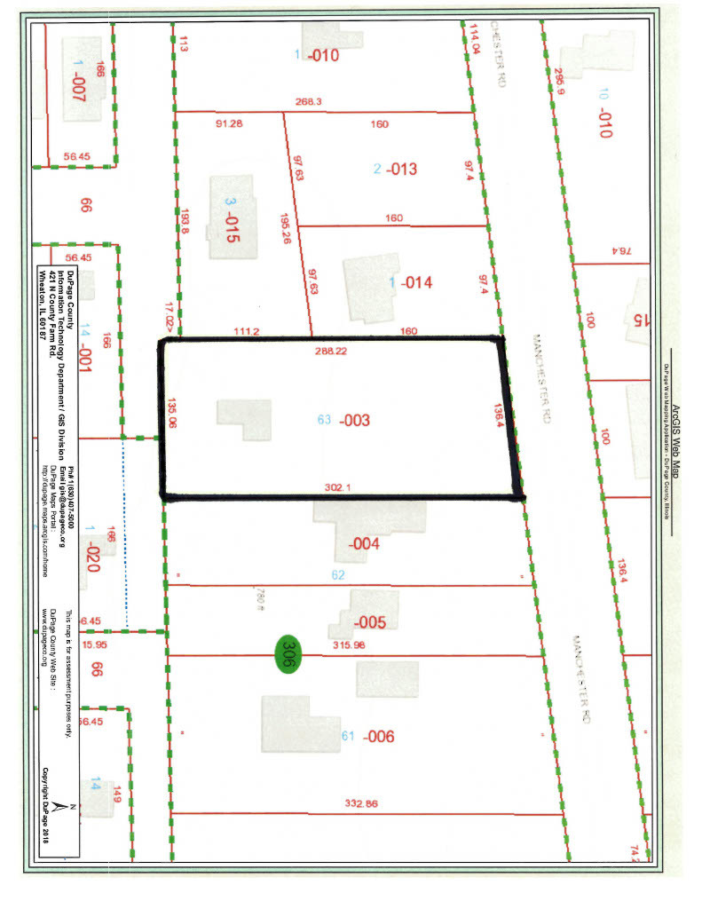 27W513 Manchester Road Winfield, IL 60190 - Photo 7 of 9 a picture of a room with a cabinet and a white refrigerator