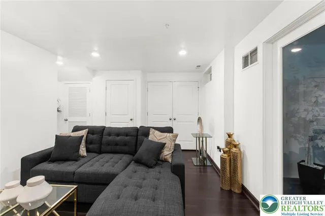 a living room with furniture and a couch