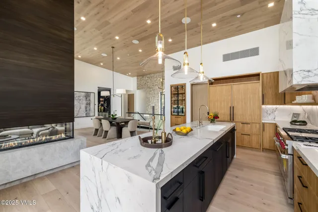 a bedroom with a bed and a fireplace