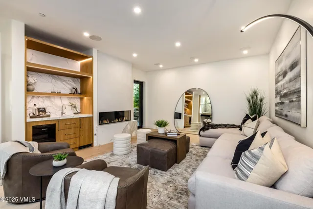 a view of a chairs and table in patio