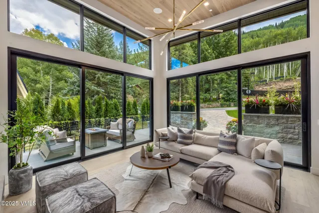 a view of a patio with couple of chairs