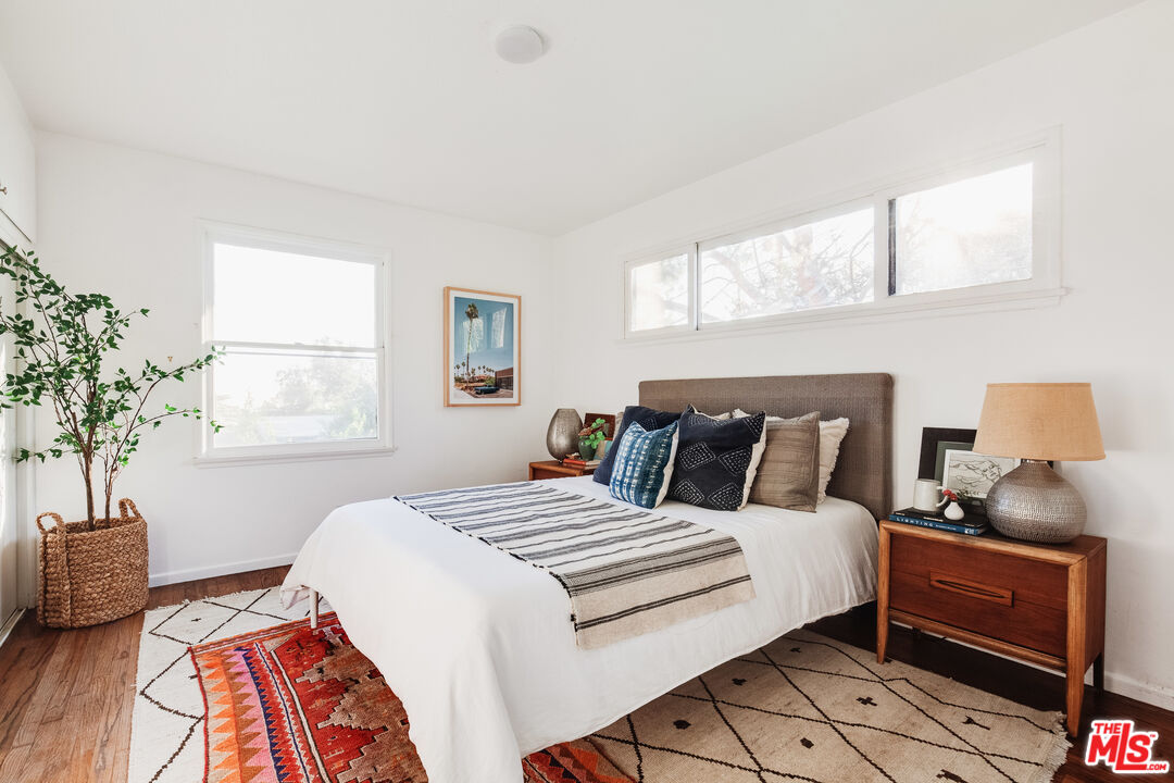 4539 Rising Hill Road Altadena, CA 91001 - Photo 17 of 27 a bedroom with a bed and a window