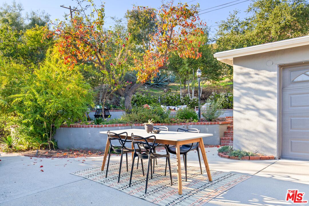4539 Rising Hill Road Altadena, CA 91001 - Photo 18 of 27 a view of patio with a table and chairs and couches