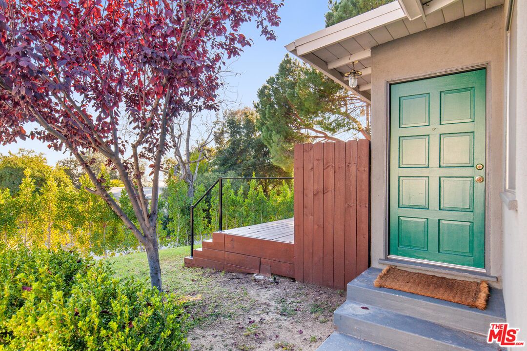 4539 Rising Hill Road Altadena, CA 91001 - Photo 2 of 27 a view of a backyard with a garden