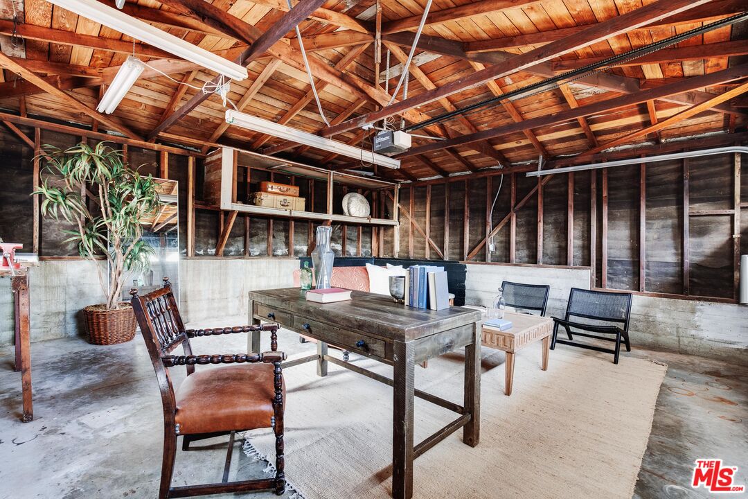 4539 Rising Hill Road Altadena, CA 91001 - Photo 23 of 27 a view of a chairs and table in a patio