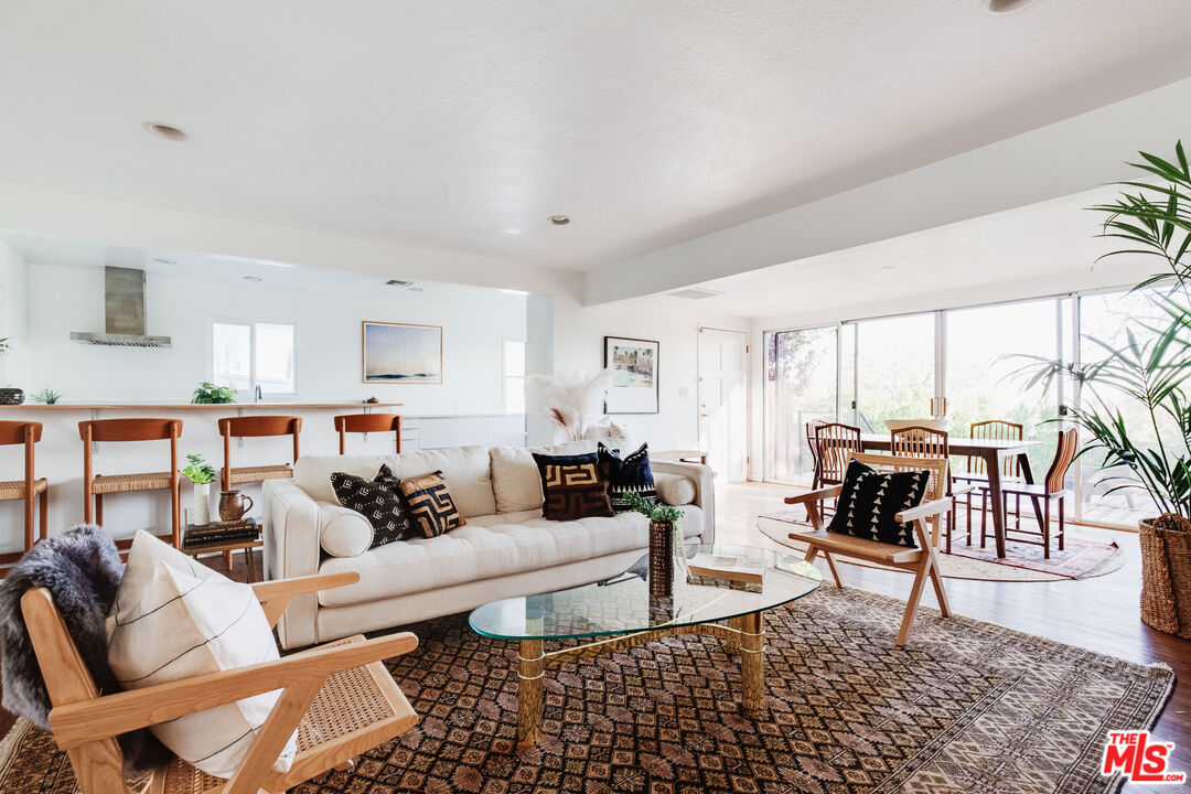 4539 Rising Hill Road Altadena, CA 91001 - Photo 5 of 27 a living room with furniture and a large window