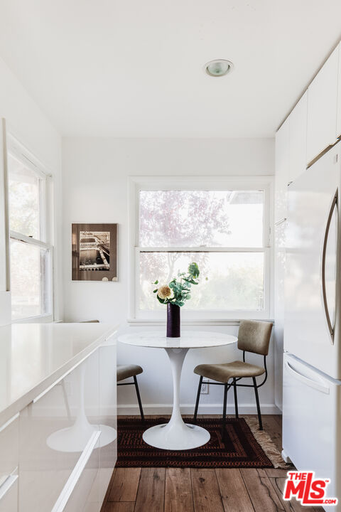 4539 Rising Hill Road Altadena, CA 91001 - Photo 10 of 27 a living room with furniture and a large window