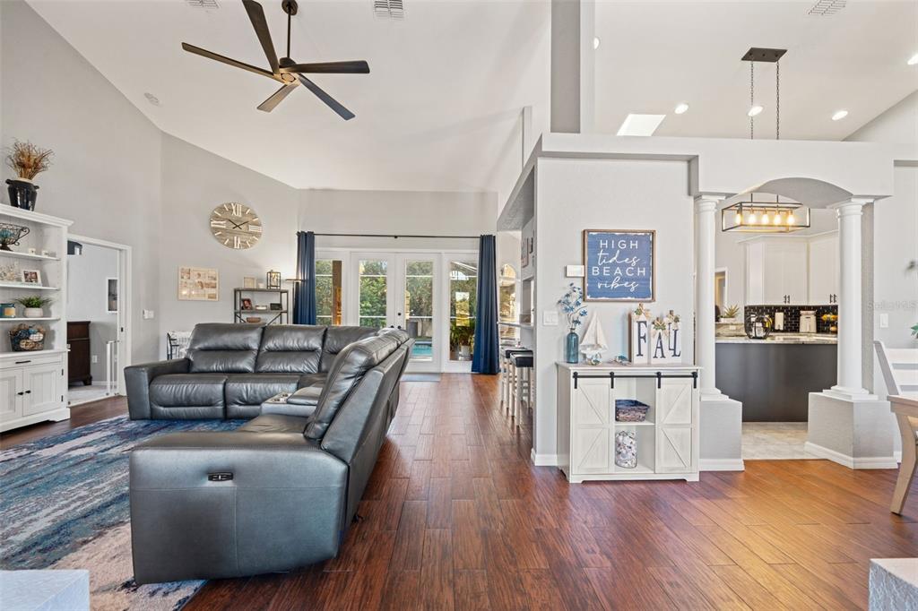 11180 Flock Avenue Weeki Wachee, FL 34613 - Photo 11 of 83 a living room with furniture and a wooden floor