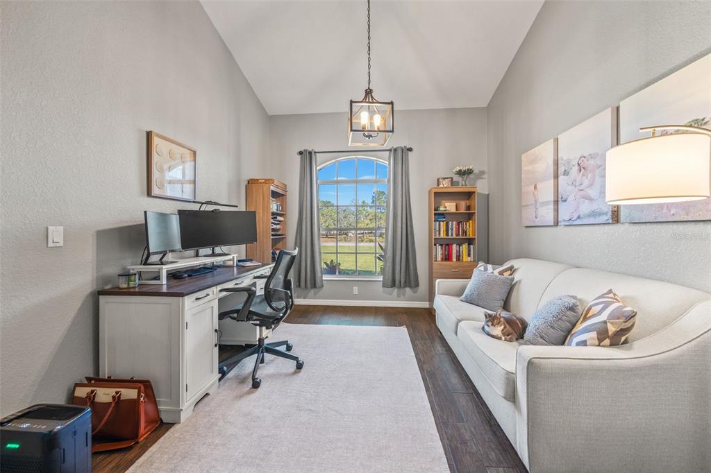 11180 Flock Avenue Weeki Wachee, FL 34613 - Photo 29 of 83 a living room with furniture and a window
