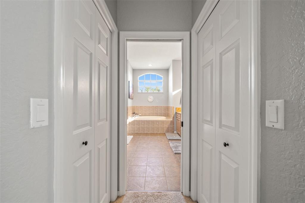 11180 Flock Avenue Weeki Wachee, FL 34613 - Photo 37 of 83 a view of a bathroom with a glass door