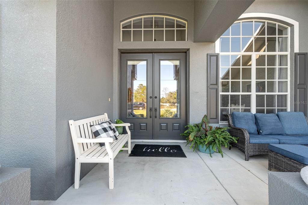 11180 Flock Avenue Weeki Wachee, FL 34613 - Photo 4 of 83 a living room with furniture and a potted plant