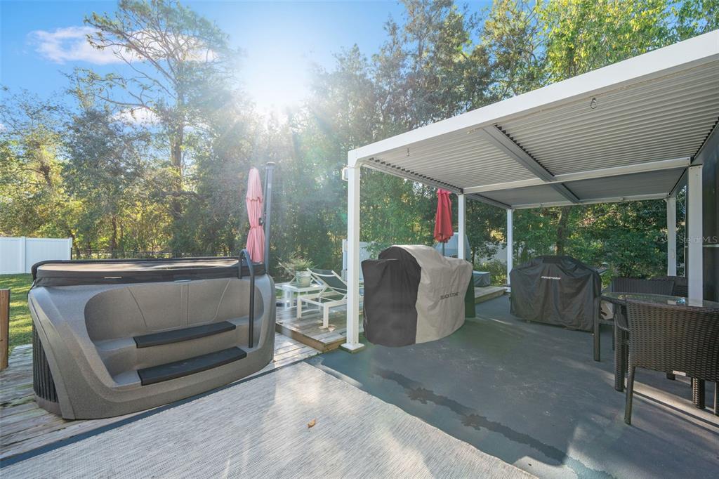 11180 Flock Avenue Weeki Wachee, FL 34613 - Photo 56 of 83 a view of outdoor space yard and patio